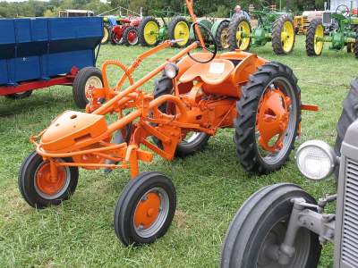 Allis-Chalmers G with rear engine and belly mounted tools