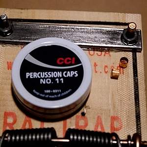 percussion caps and mounting posts